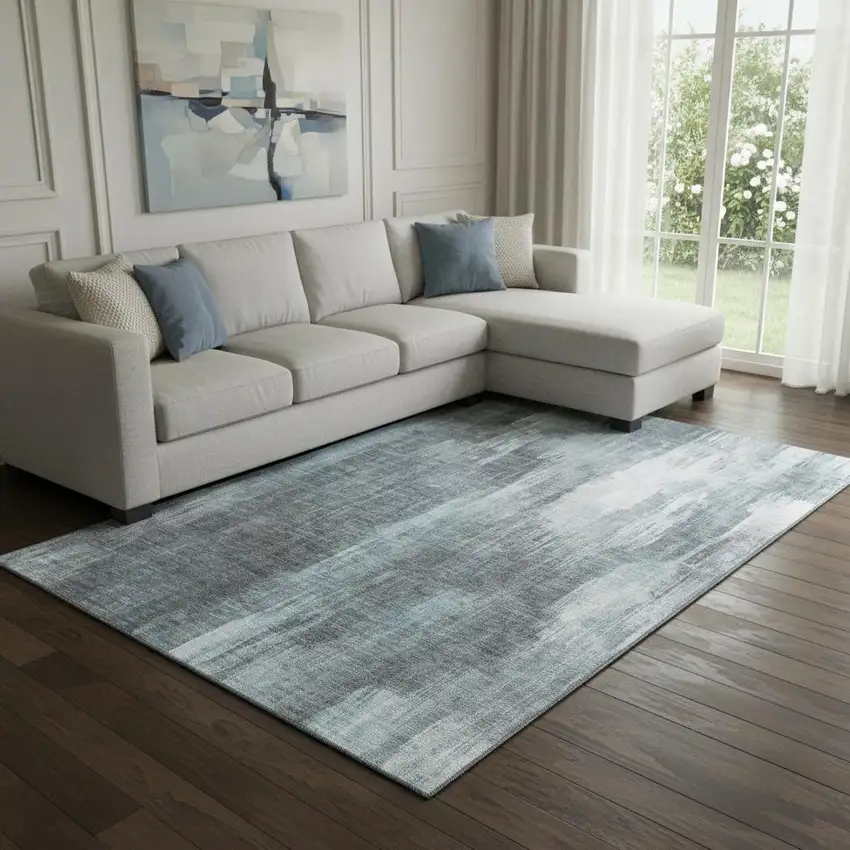 Teal And Ivory Abstract Washable Area Rug With UV Protection Photo 3