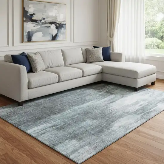 Teal And Ivory Abstract Washable Area Rug With UV Protection Photo 1