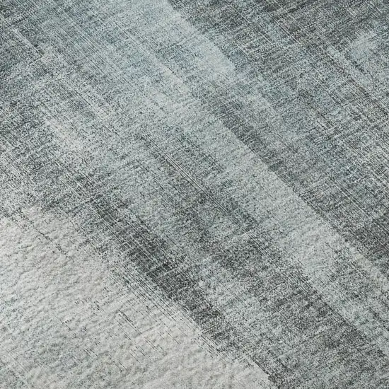 Teal And Ivory Abstract Washable Area Rug With UV Protection Photo 9