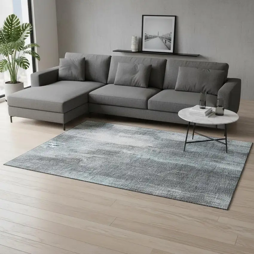 Teal And Ivory Abstract Washable Area Rug With UV Protection Photo 2