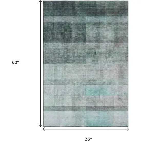 Teal And Ivory Abstract Washable Area Rug With UV Protection Photo 5