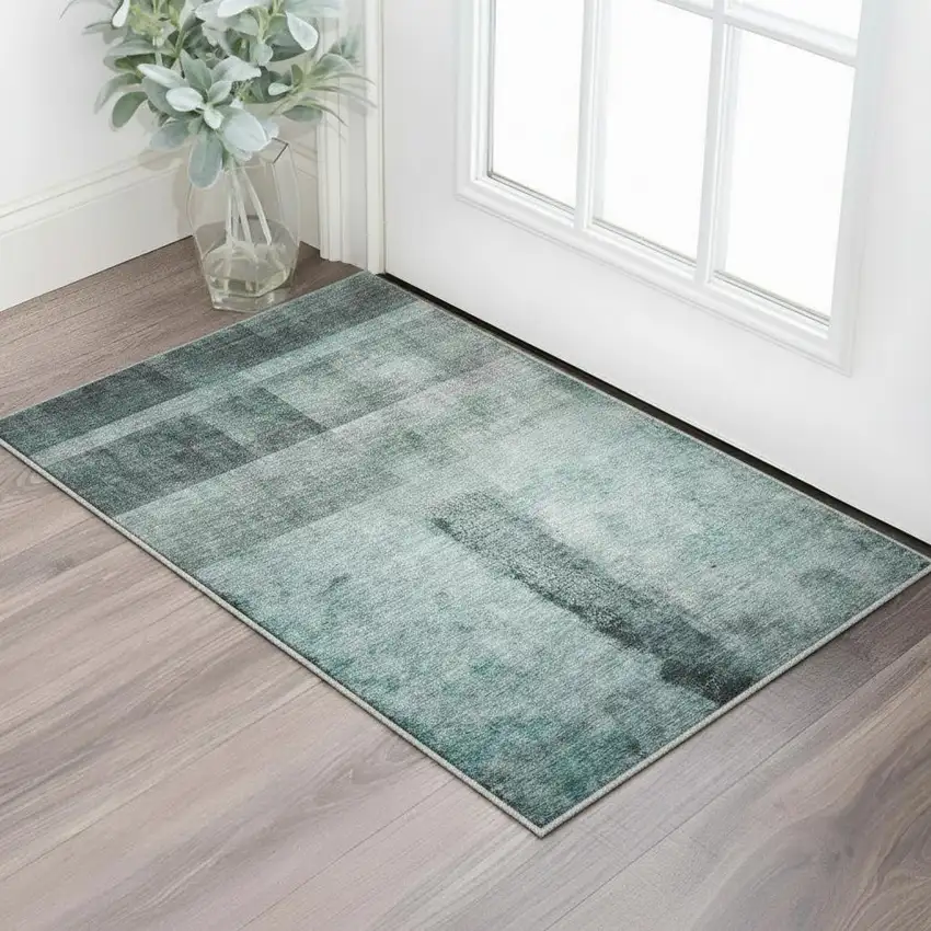 Teal And Ivory Abstract Washable Area Rug With UV Protection Photo 2