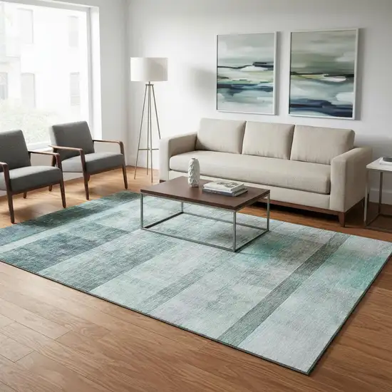 Teal And Ivory Abstract Washable Area Rug With UV Protection Photo 2