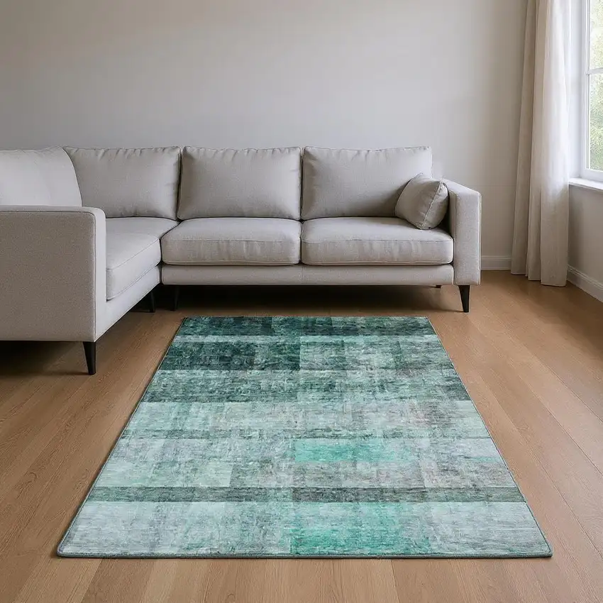 Teal And Ivory Abstract Washable Area Rug With UV Protection Photo 2