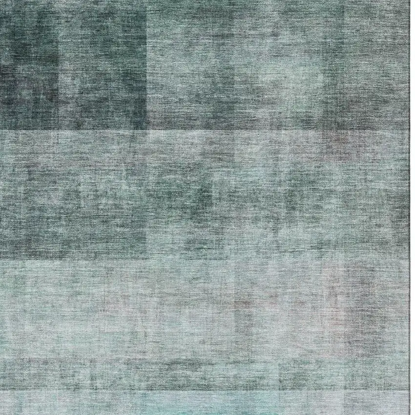 Teal And Ivory Abstract Washable Area Rug With UV Protection Photo 3