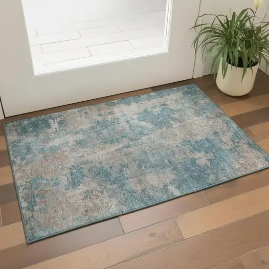 Teal And Ivory Abstract Washable Area Rug With UV Protection Photo 1