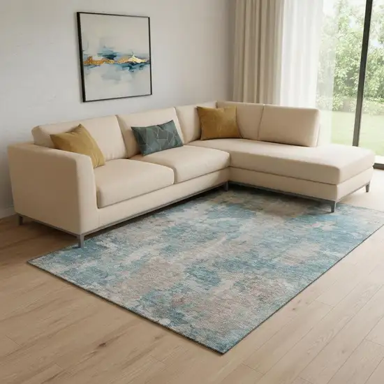 Teal And Ivory Abstract Washable Area Rug With UV Protection Photo 1