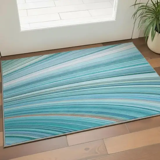 Teal And Ivory Abstract Washable Area Rug With UV Protection Photo 2