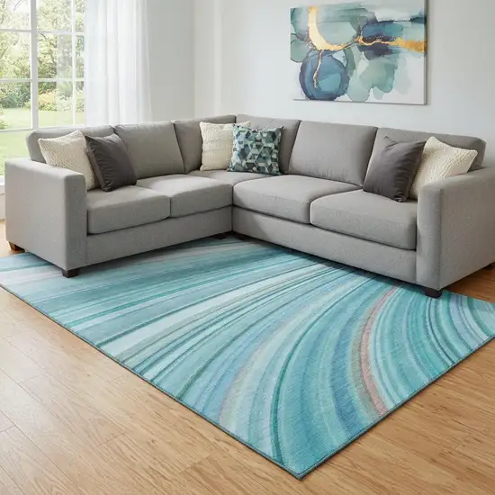Teal And Ivory Abstract Washable Area Rug With UV Protection Photo 1
