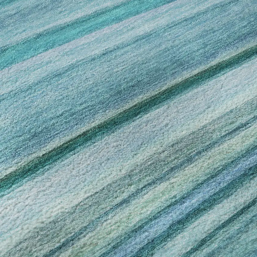 Teal And Ivory Abstract Washable Area Rug With UV Protection Photo 9