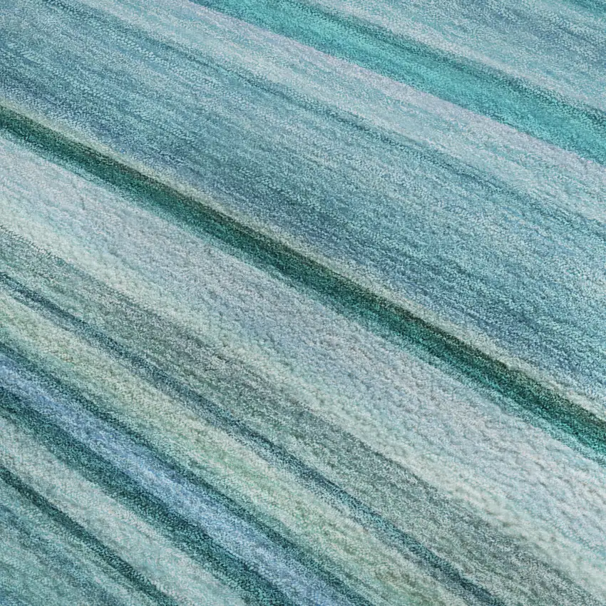 Teal And Ivory Abstract Washable Area Rug With UV Protection Photo 4