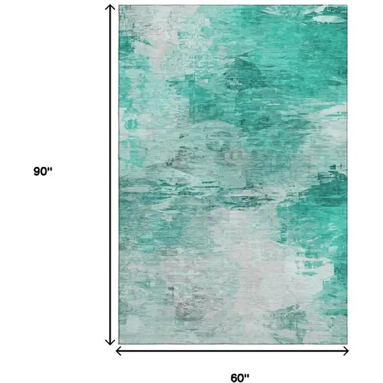 Teal And Ivory Abstract Washable Area Rug With UV Protection Photo 7