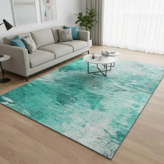 Teal And Ivory Abstract Washable Area Rug With UV Protection Photo 2