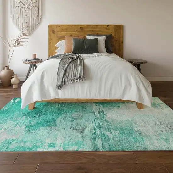 Teal And Ivory Abstract Washable Area Rug With UV Protection Photo 6