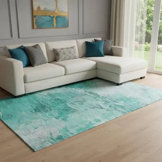 Teal And Ivory Abstract Washable Area Rug With UV Protection Photo 1