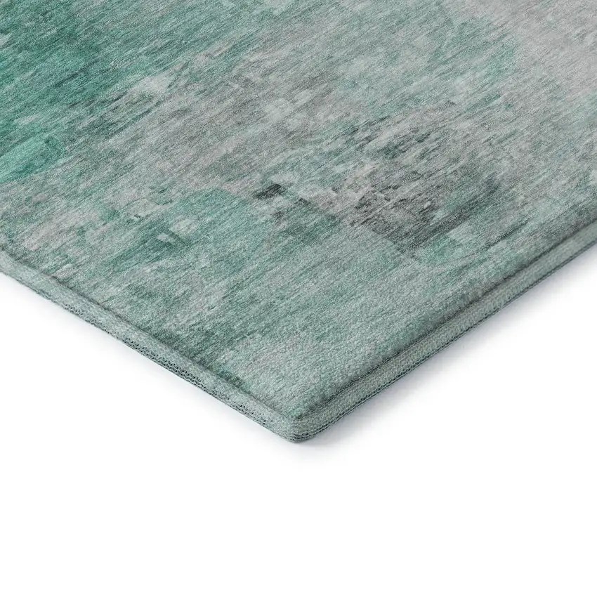 Teal And Ivory Abstract Washable Area Rug With UV Protection Photo 9