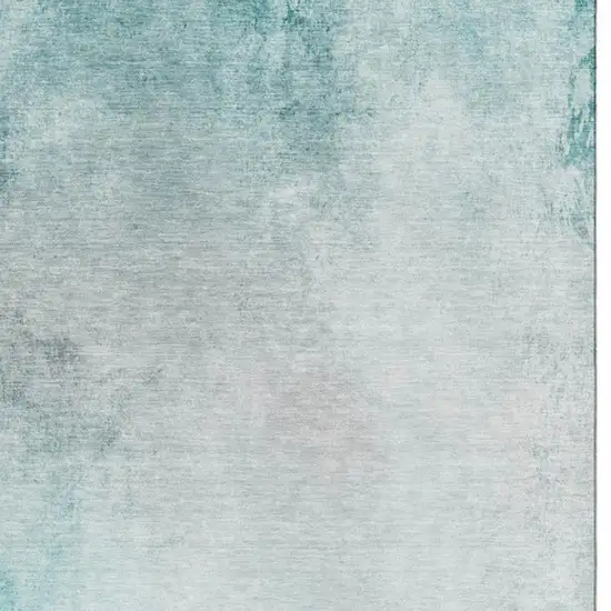 Teal And Ivory Abstract Washable Area Rug With UV Protection Photo 6