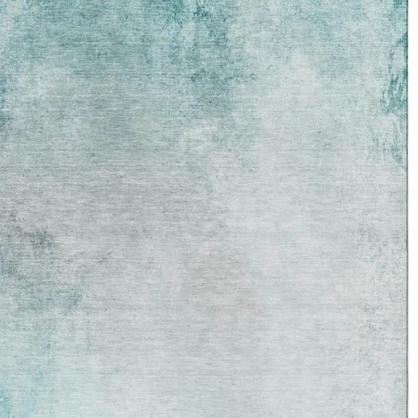 Teal And Ivory Abstract Washable Area Rug With UV Protection Photo 6