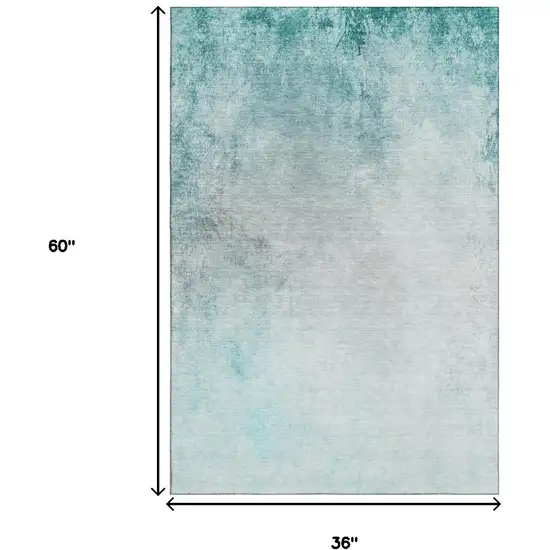 Teal And Ivory Abstract Washable Area Rug With UV Protection Photo 3
