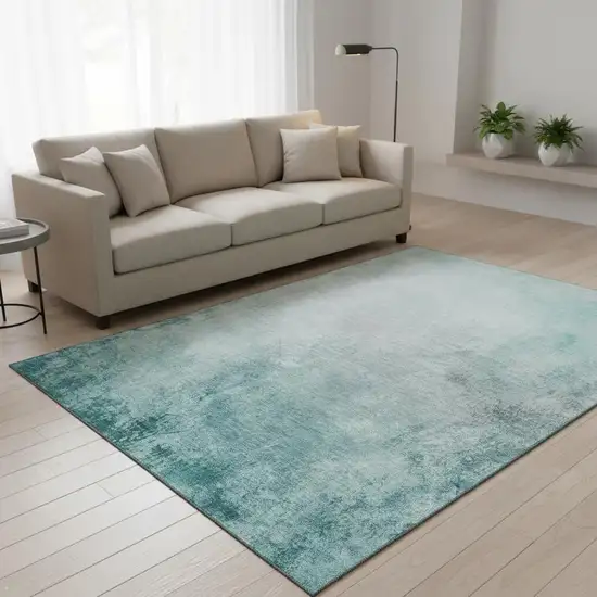 Teal And Ivory Abstract Washable Area Rug With UV Protection Photo 2