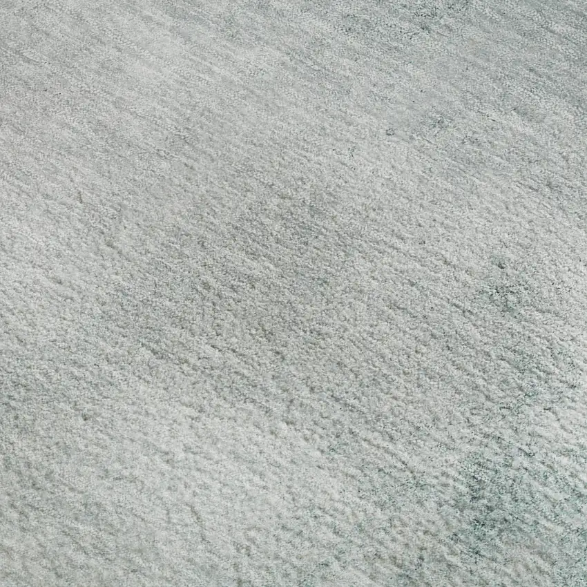 Teal And Ivory Abstract Washable Area Rug With UV Protection Photo 8