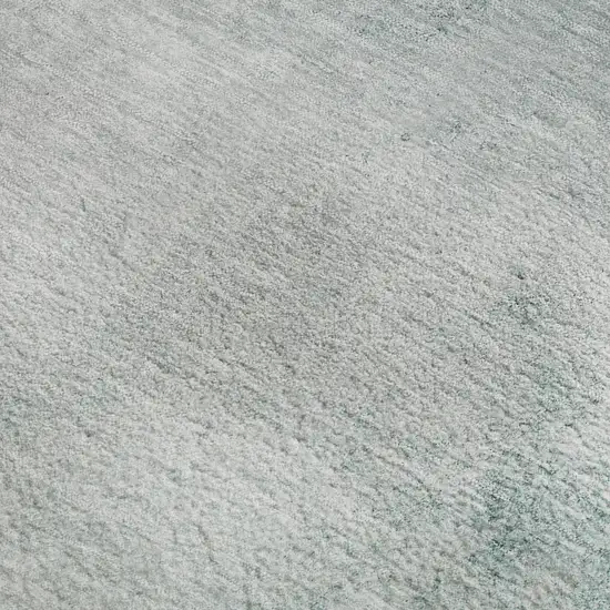 Teal And Ivory Abstract Washable Area Rug With UV Protection Photo 8