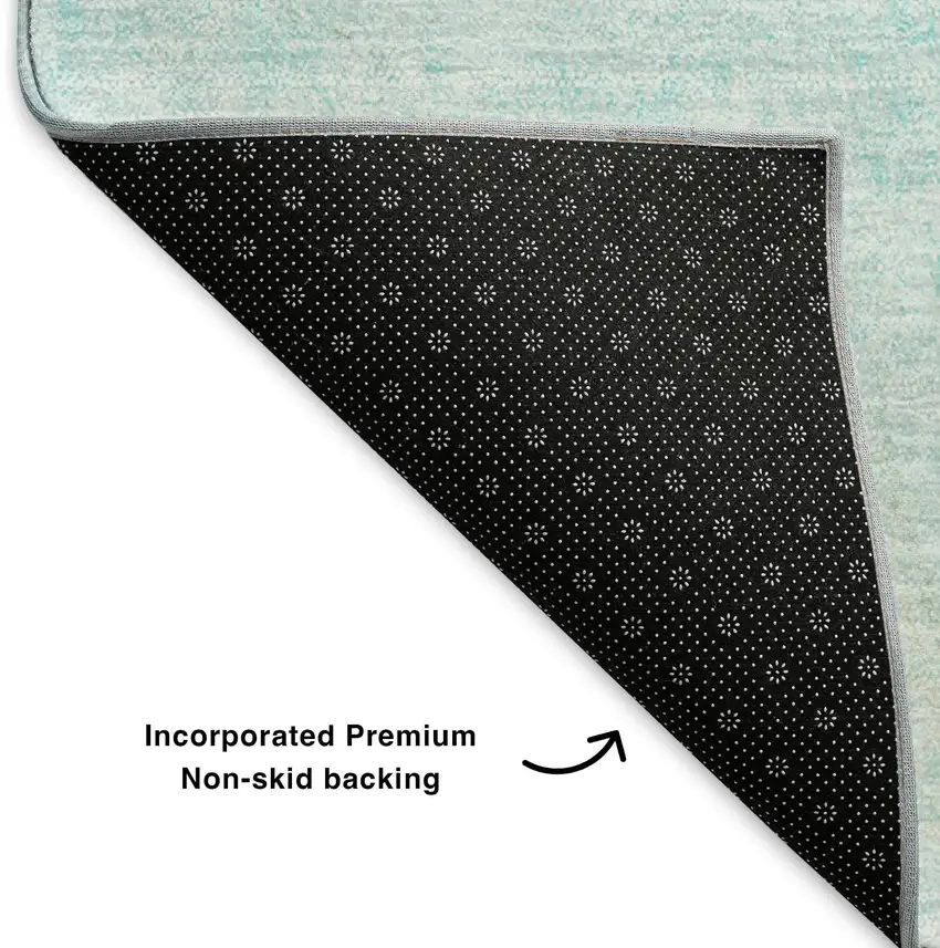 Teal And Ivory Abstract Washable Area Rug With UV Protection Photo 9