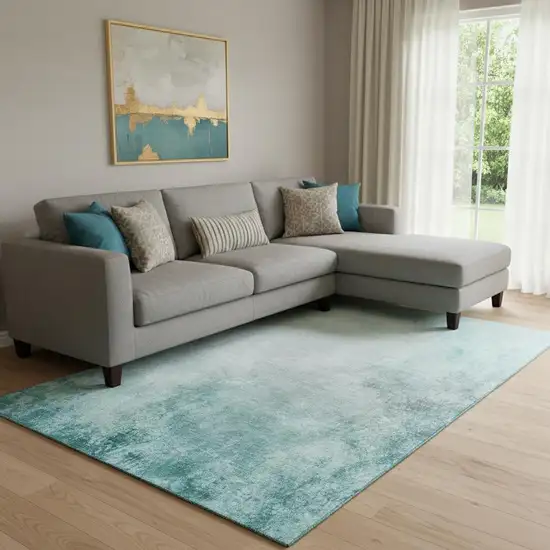 Teal And Ivory Abstract Washable Area Rug With UV Protection Photo 1