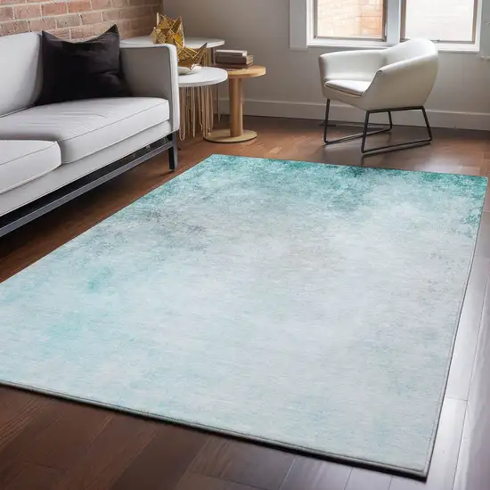Teal And Ivory Abstract Washable Area Rug With UV Protection Photo 4