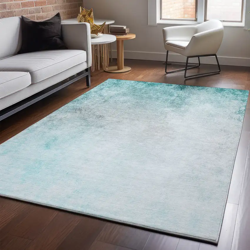 Teal And Ivory Abstract Washable Area Rug With UV Protection Photo 4