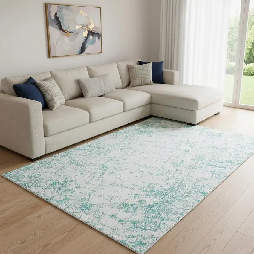 Teal And Ivory Abstract Washable Area Rug With UV Protection Photo 1