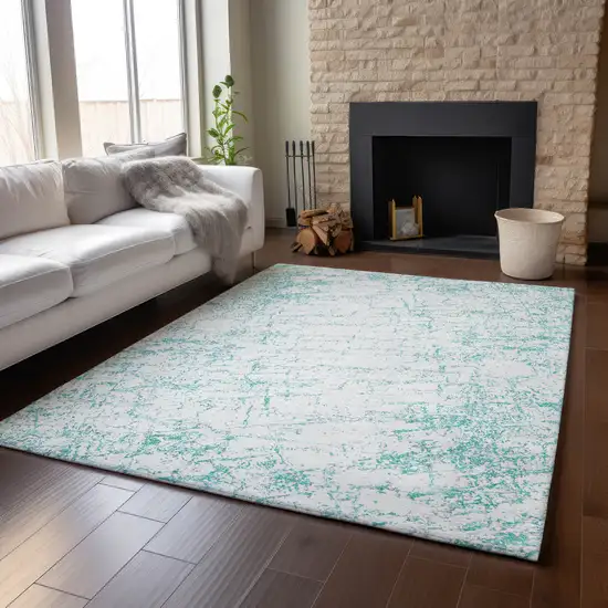 Teal And Ivory Abstract Washable Area Rug With UV Protection Photo 4