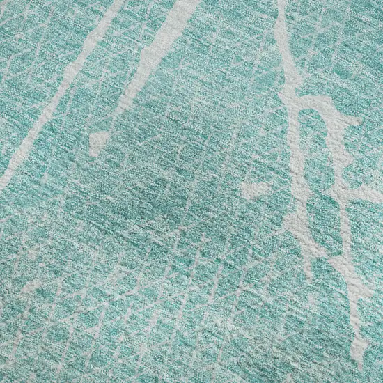 Teal And Ivory Abstract Washable Area Rug With UV Protection Photo 3