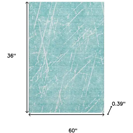 Teal And Ivory Abstract Washable Area Rug With UV Protection Photo 3