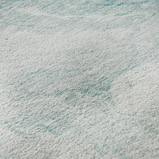 Teal And Ivory Abstract Washable Area Rug With UV Protection Photo 8