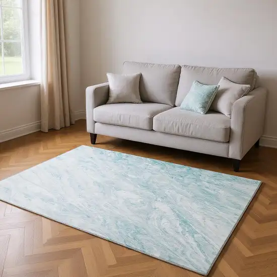 Teal And Ivory Abstract Washable Area Rug With UV Protection Photo 2