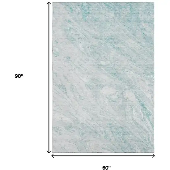 Teal And Ivory Abstract Washable Area Rug With UV Protection Photo 3