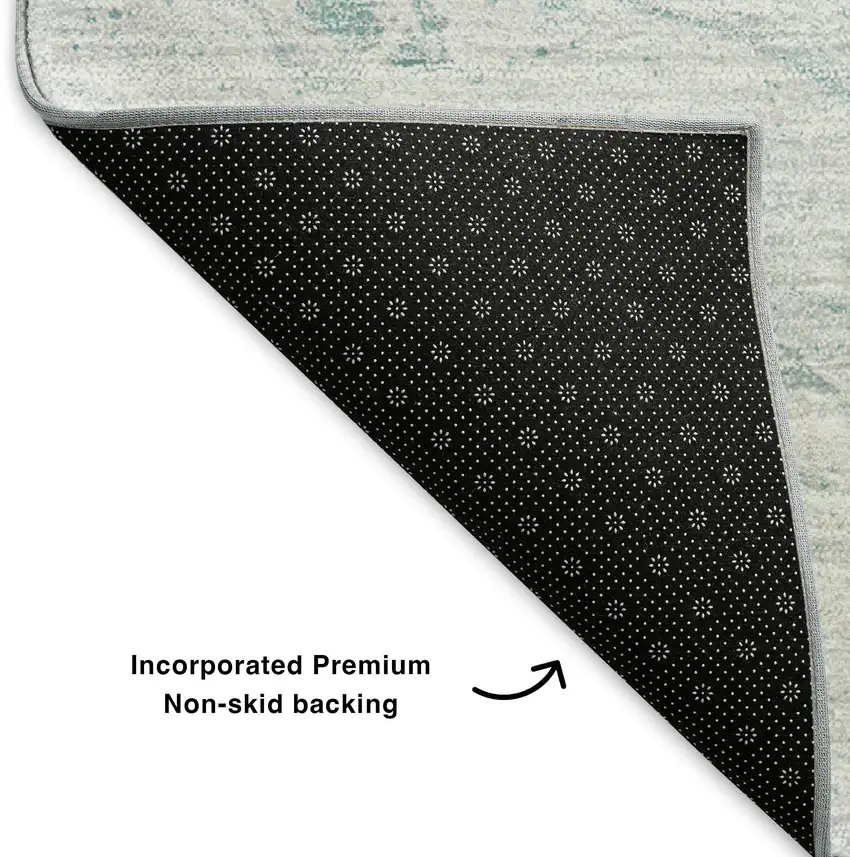 Teal And Ivory Abstract Washable Area Rug With UV Protection Photo 7