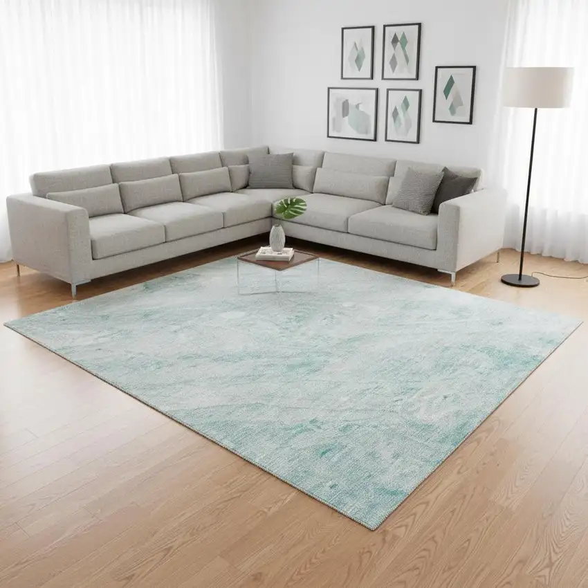 Teal And Ivory Abstract Washable Area Rug With UV Protection Photo 2