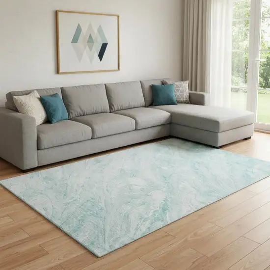 Teal And Ivory Abstract Washable Area Rug With UV Protection Photo 1