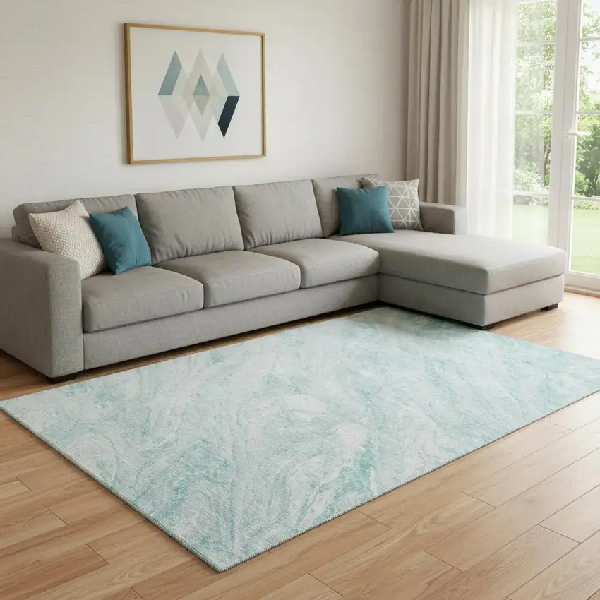 Teal And Ivory Abstract Washable Area Rug With UV Protection Photo 1