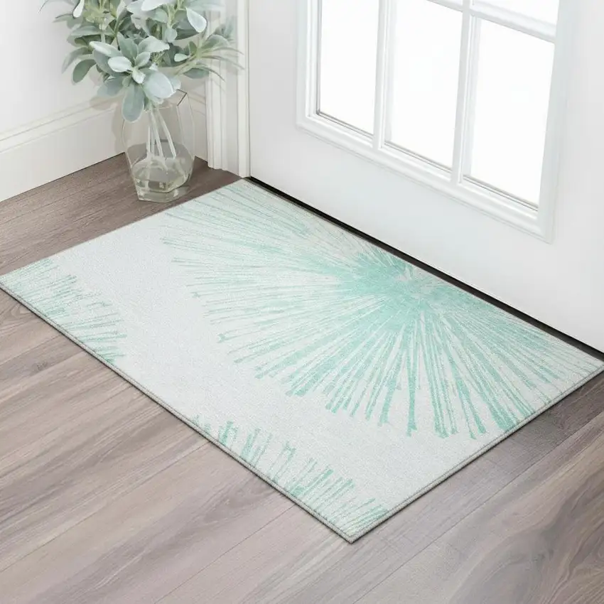 Teal And Ivory Abstract Washable Area Rug With UV Protection Photo 2