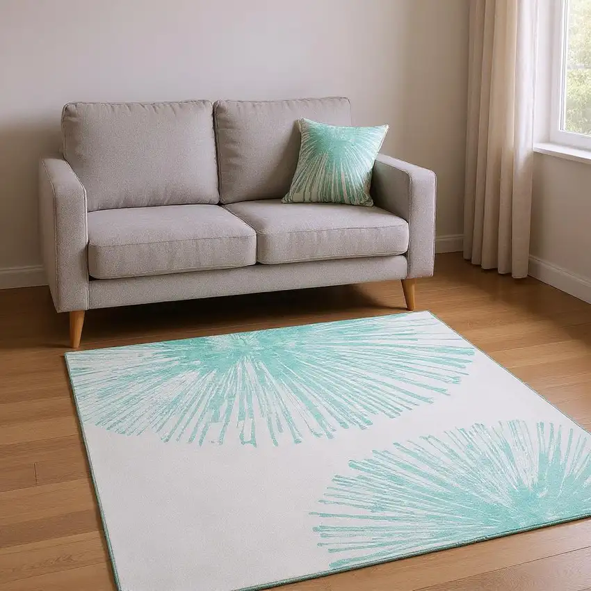 Teal And Ivory Abstract Washable Area Rug With UV Protection Photo 2