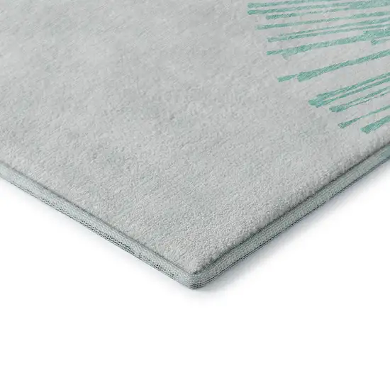 Teal And Ivory Abstract Washable Area Rug With UV Protection Photo 9