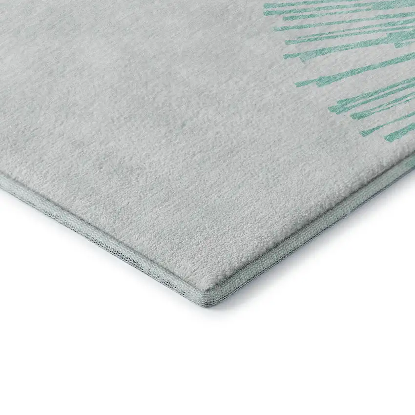 Teal And Ivory Abstract Washable Area Rug With UV Protection Photo 9