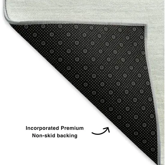 Teal And Ivory Abstract Washable Area Rug With UV Protection Photo 8