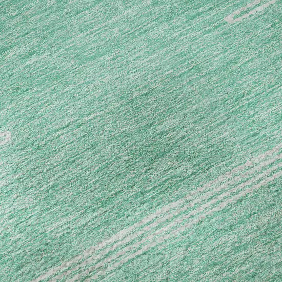 Teal And Ivory Abstract Washable Area Rug With UV Protection Photo 9