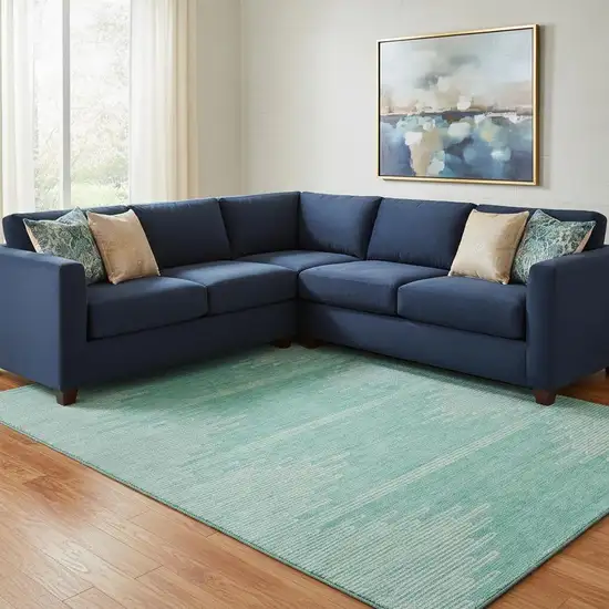 Teal And Ivory Abstract Washable Area Rug With UV Protection Photo 1