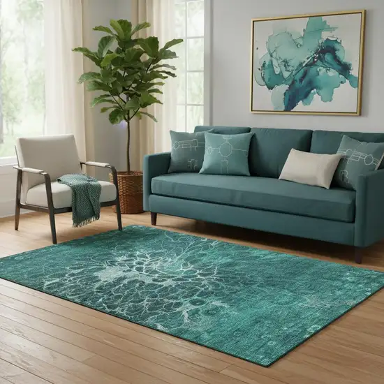 Teal And Ivory Abstract Washable Area Rug With UV Protection Photo 1