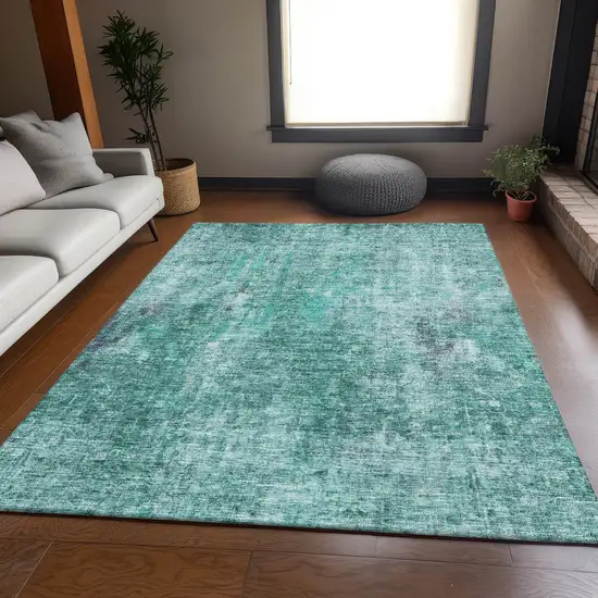 Teal And Ivory Abstract Washable Area Rug With UV Protection Photo 3